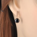 Oceľové visiace náušnice Čierne koliesko